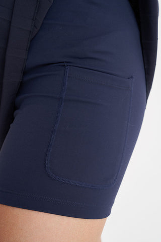 BIRDIE PLEATED GOLF SKORT NAVY